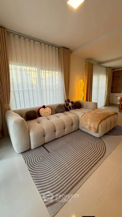 Spacious living room with modern sofa and stylish decor