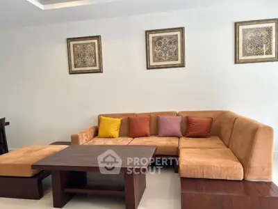 Elegant living room with cozy sectional sofa and stylish decor