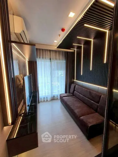 Modern living room with sleek design and ambient lighting