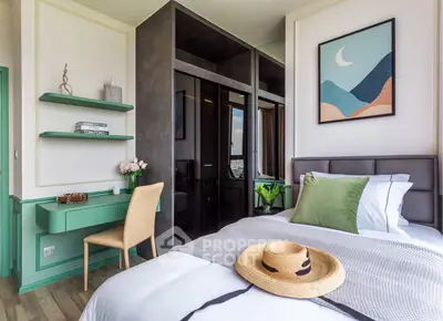 Stylish bedroom with modern decor and scenic view, featuring elegant furniture and cozy ambiance.