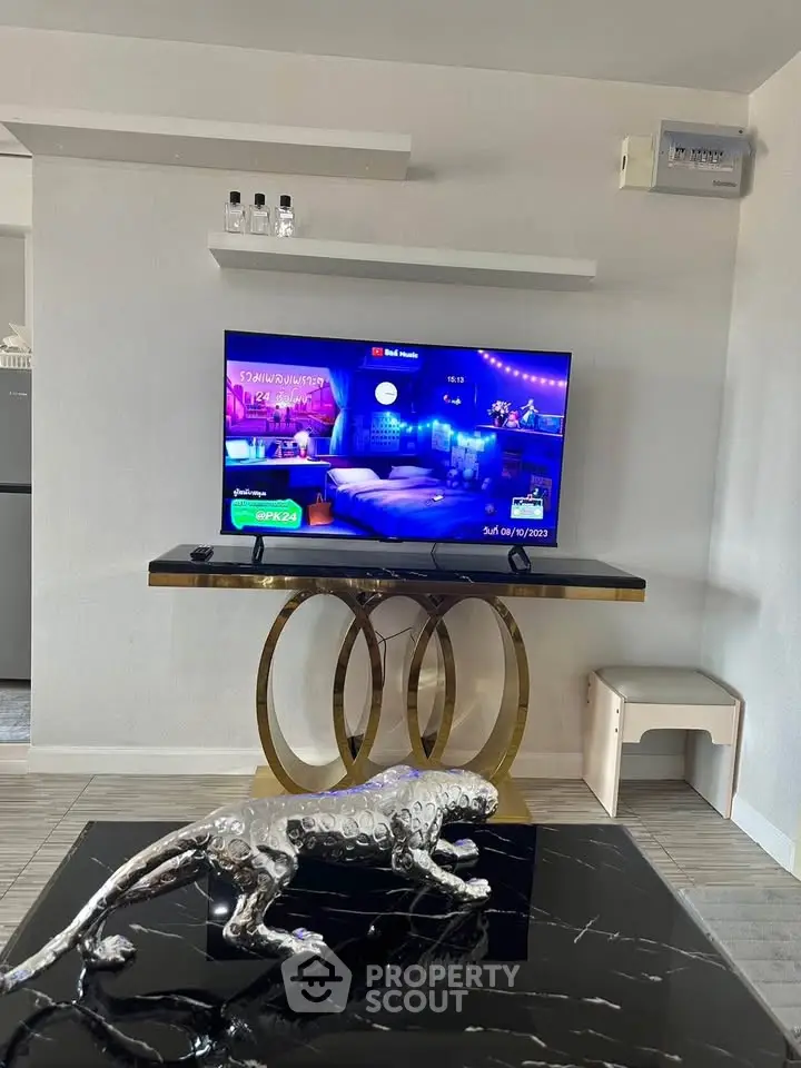 Modern living room with sleek decor and stylish TV setup