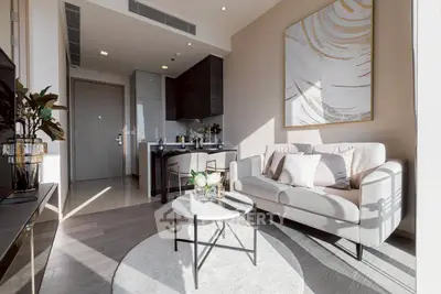 Modern living room with stylish decor and natural light in a contemporary apartment.