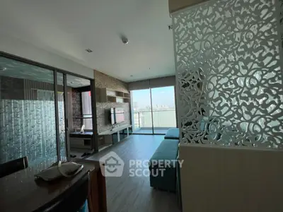 Spacious modern living room with city view and stylish partition