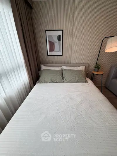 Cozy bedroom with modern decor and natural light