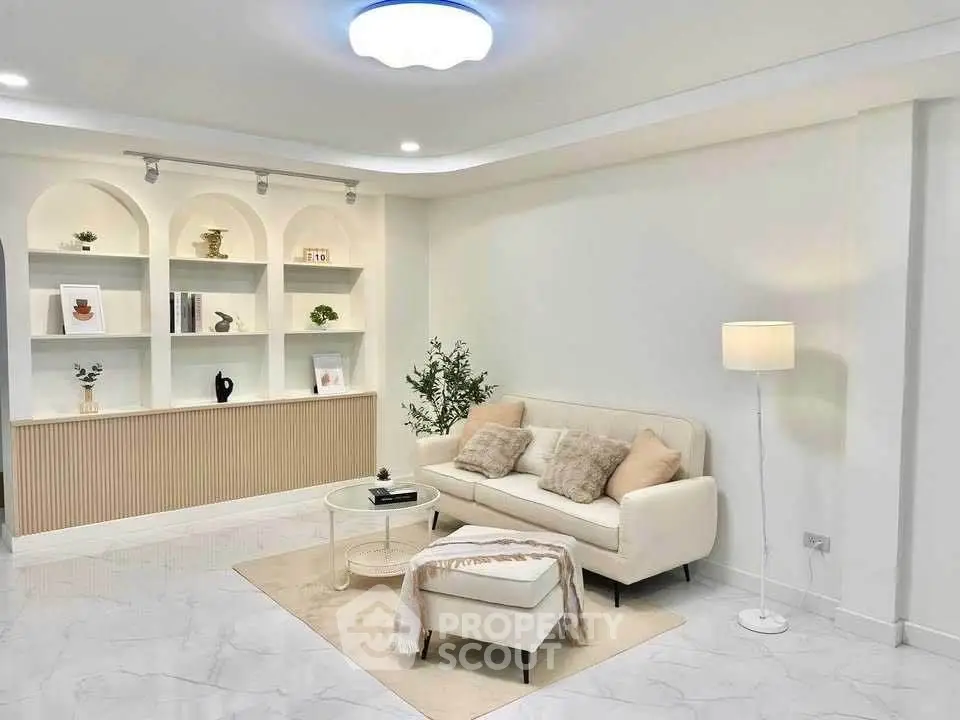 Elegant living room with modern decor and cozy seating area