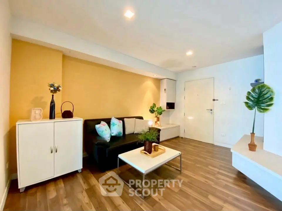 Modern living room with stylish decor and wooden flooring