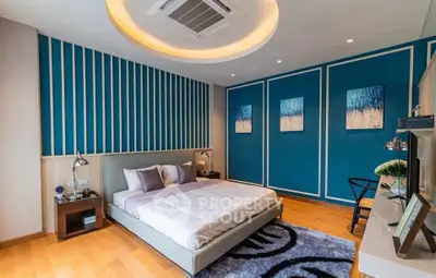 Luxurious modern bedroom with stylish decor and cozy ambiance