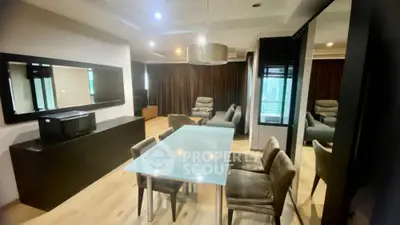 Spacious modern living room with elegant dining set, plush seating, and sleek entertainment unit, perfect for urban living.