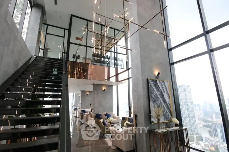 Luxurious modern living room with high ceilings and panoramic city views in a stylish duplex apartment.