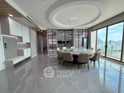 Luxurious modern dining area with panoramic city views and elegant furnishings.