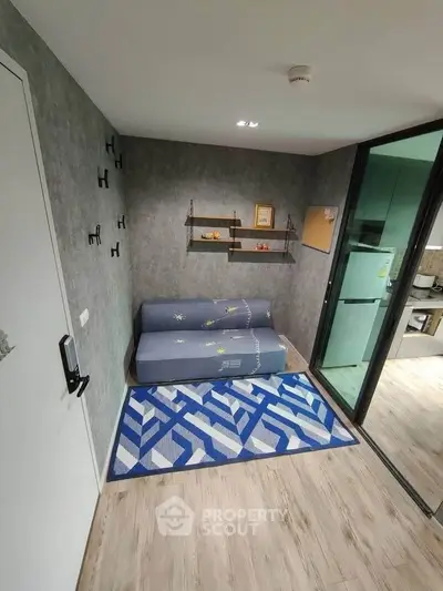 Modern compact living space with stylish decor and open kitchen layout
