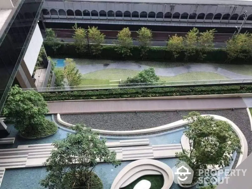 Stunning aerial view of modern landscaped garden in luxury apartment complex