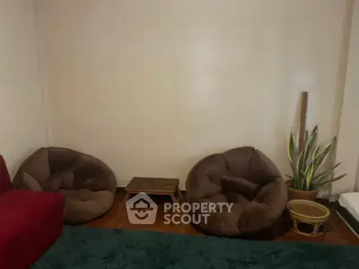 Cozy living room with plush bean bag chairs and stylish decor