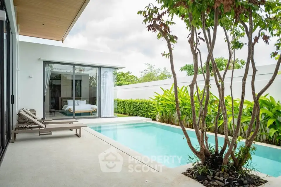 Luxurious villa with private pool and lush garden, perfect for relaxation and leisure.