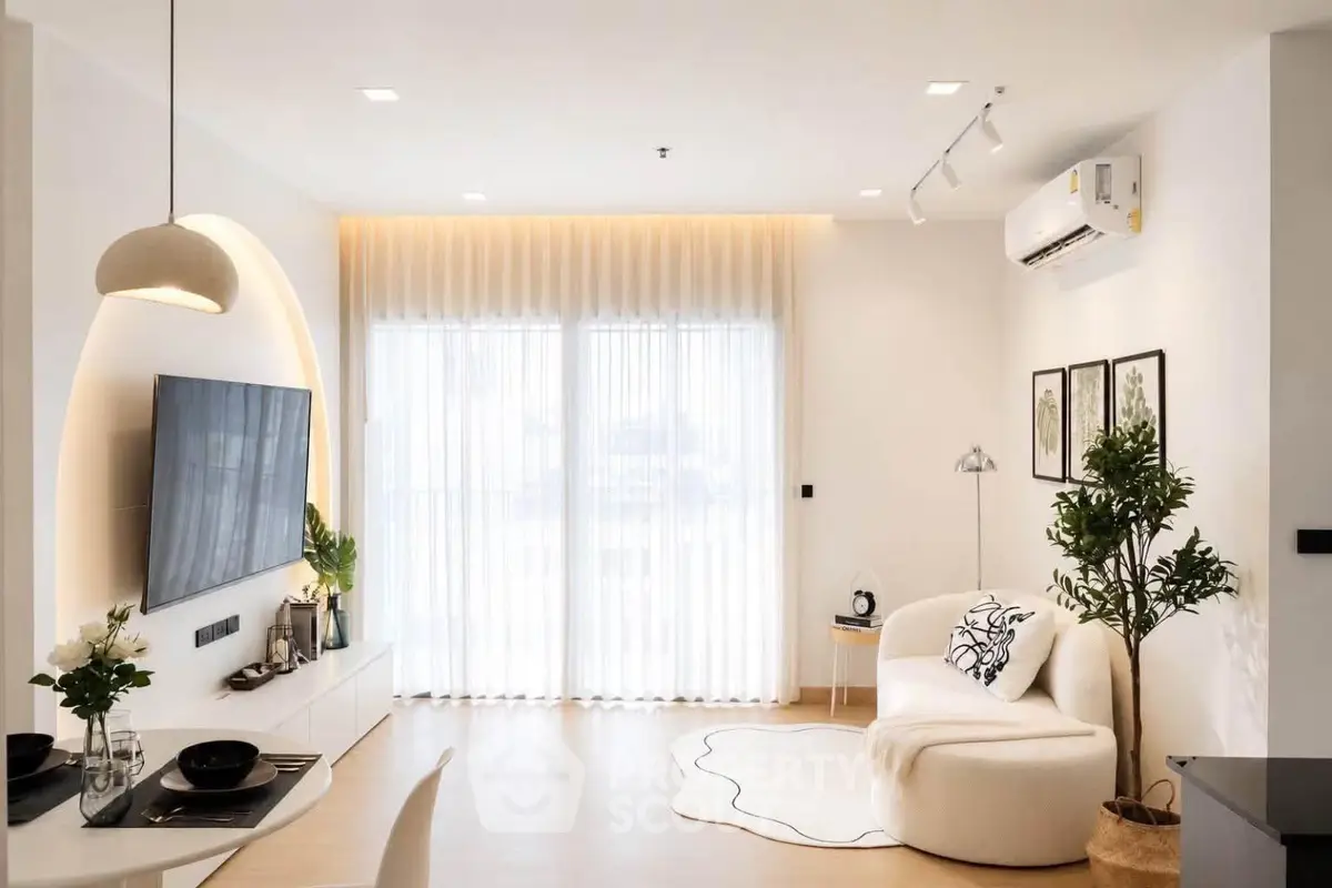 Modern living room with stylish decor and natural light
