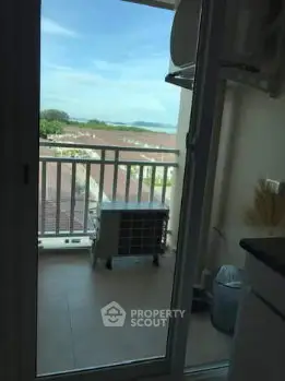 Charming balcony with scenic view and ample space for relaxation.