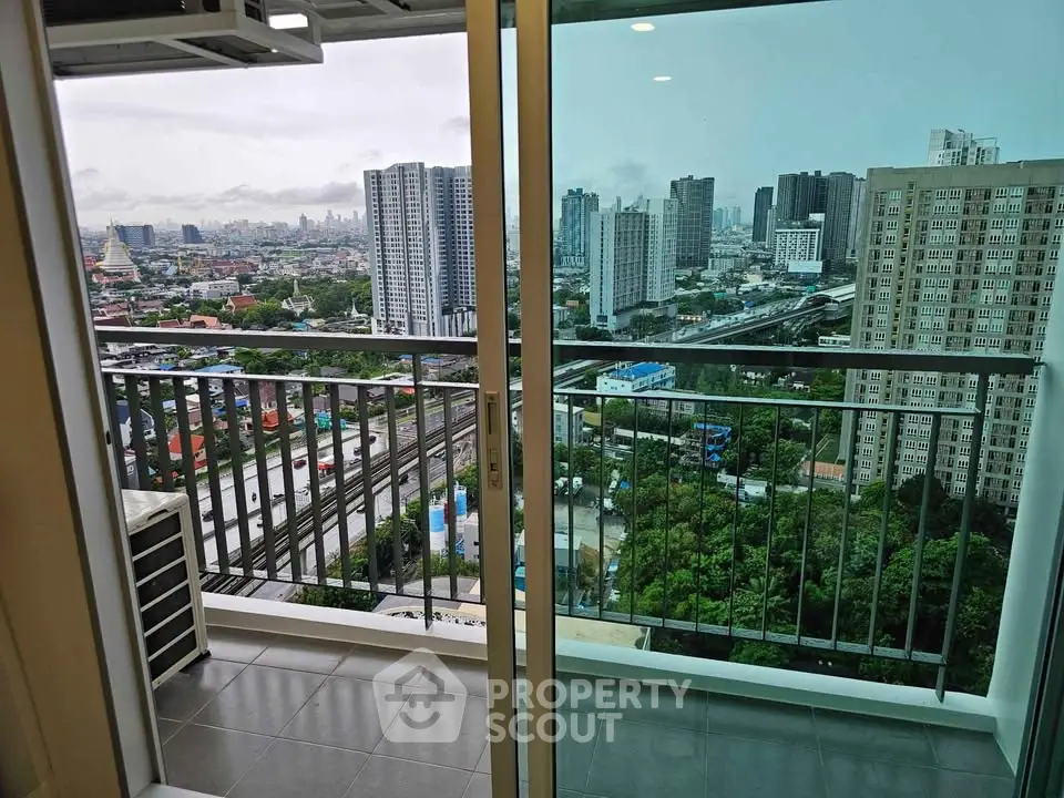 Stunning cityscape view from a modern high-rise balcony, perfect for urban living enthusiasts.