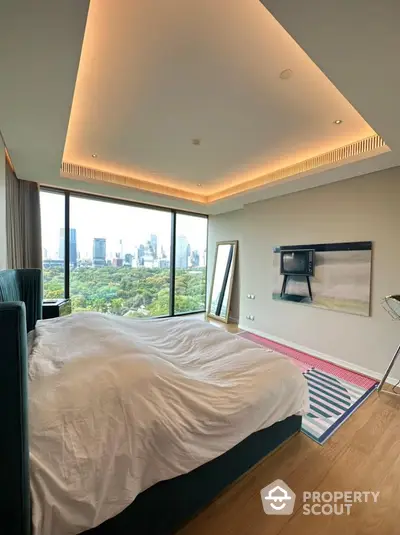 Luxurious bedroom with stunning city view and modern decor