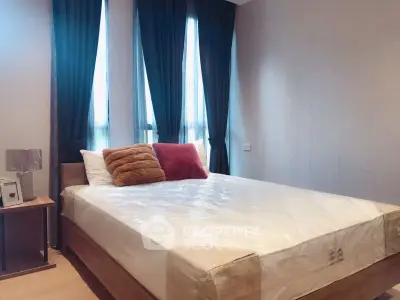 Cozy bedroom with modern decor and natural light
