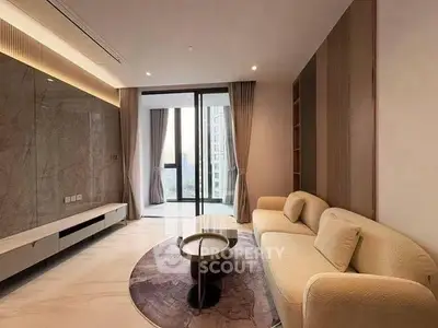 Luxurious modern living room with elegant sofa and stunning city view from large windows.