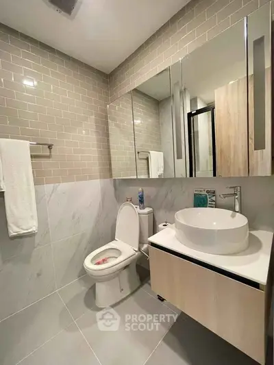 Modern bathroom with sleek fixtures and stylish tile design
