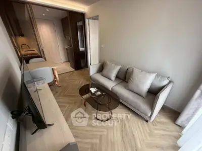 Modern living room with sleek furniture and stylish decor in a contemporary apartment.