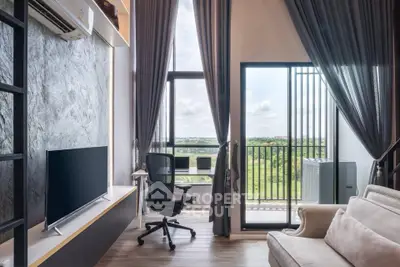 Modern living room with balcony and scenic view, featuring stylish decor and natural light.