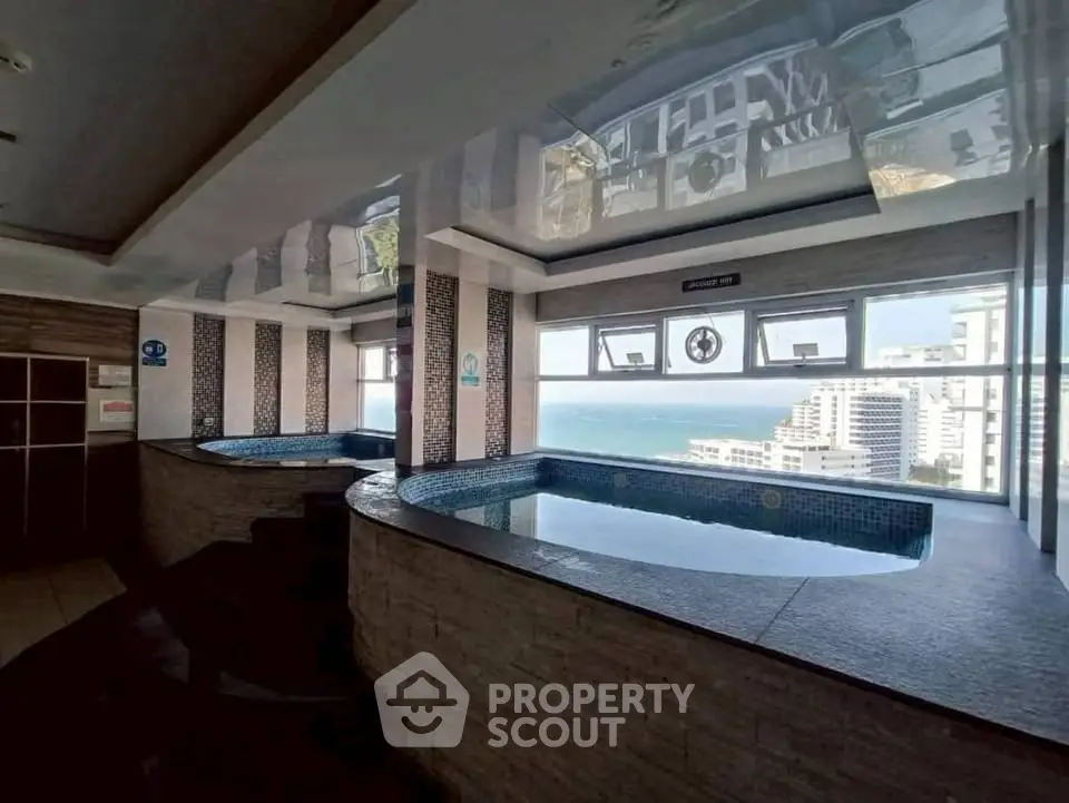 Luxurious rooftop pool with stunning ocean view in high-rise building
