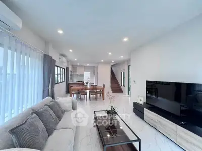 Spacious modern living room with open layout and elegant decor