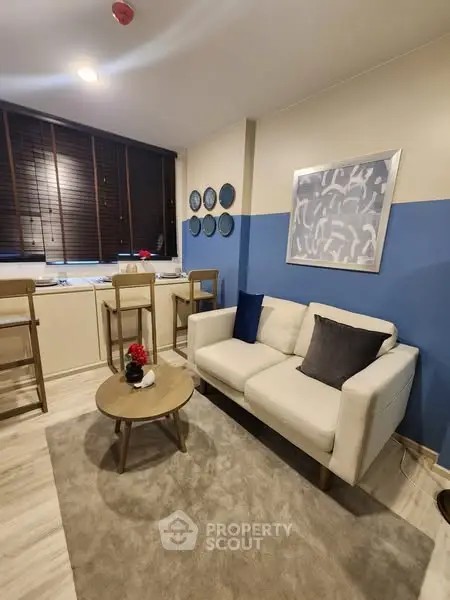 Chic modern living room with cozy sofa and stylish decor