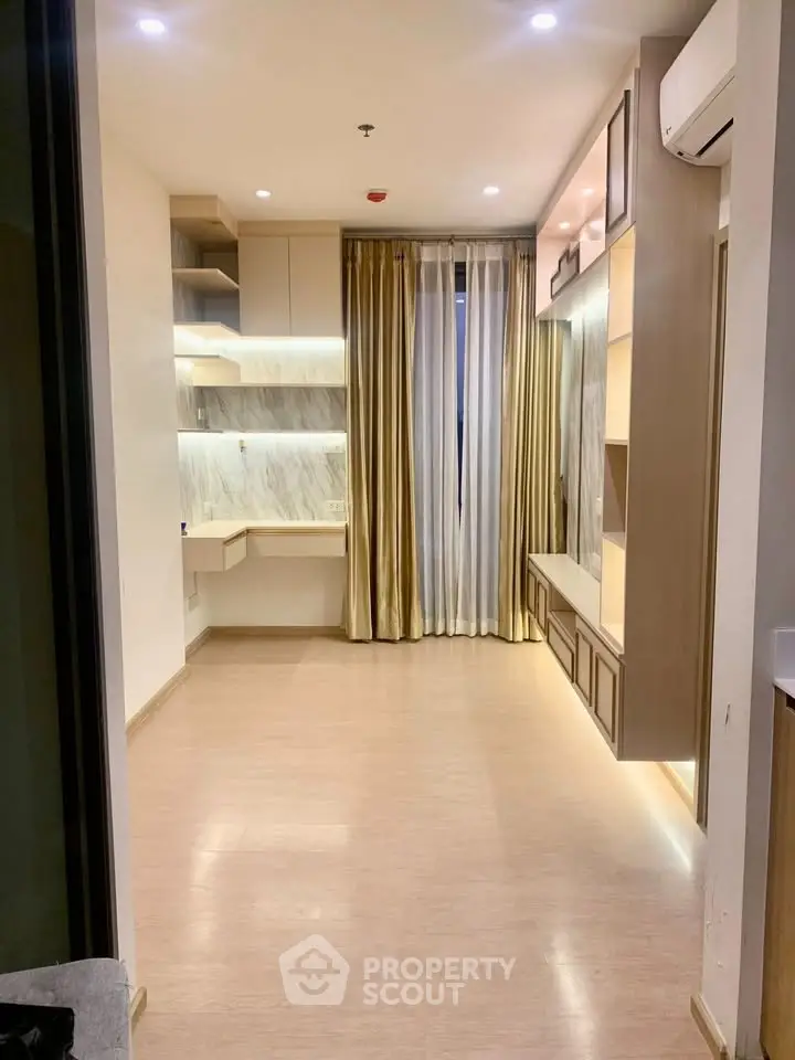 Modern living room with elegant built-in shelves and ambient lighting