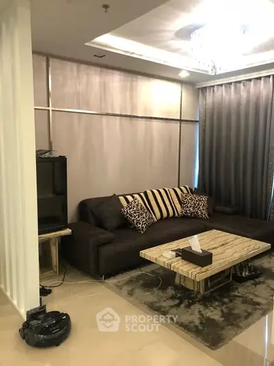 Luxurious living room with elegant decor and modern furniture, perfect for relaxation and entertainment.