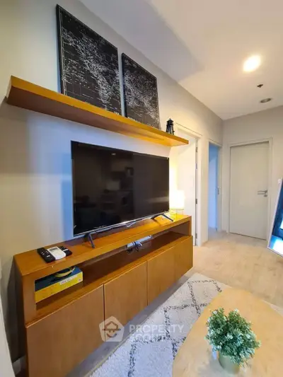 Modern living room with sleek TV unit and stylish decor