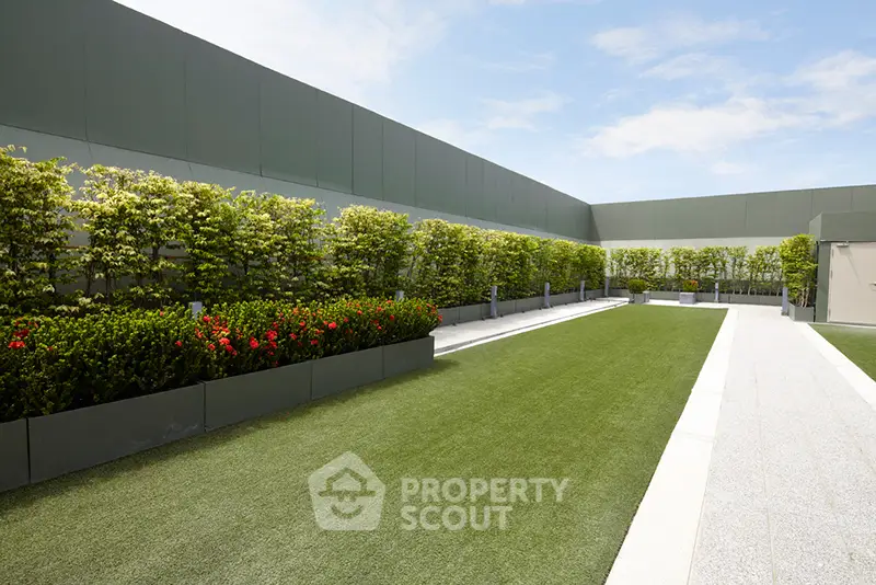 Stunning rooftop garden with lush greenery and open sky view.