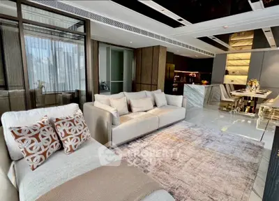 Luxurious modern living room with elegant decor and spacious open layout.