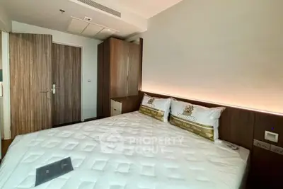 Modern bedroom with stylish wooden accents and cozy lighting