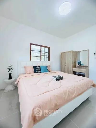 Cozy bedroom with modern decor and natural light