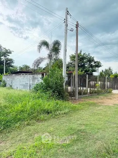 Charming suburban property with lush greenery and spacious outdoor area, perfect for development opportunities.