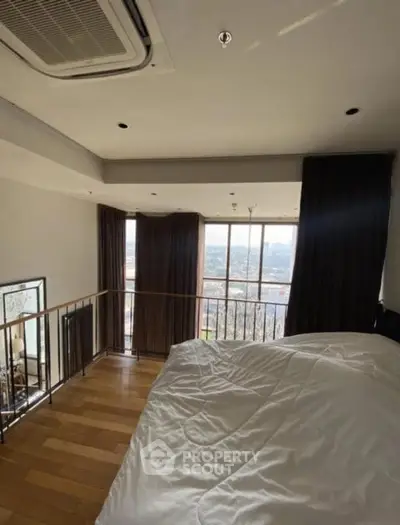 Luxurious bedroom with stunning city view and modern design