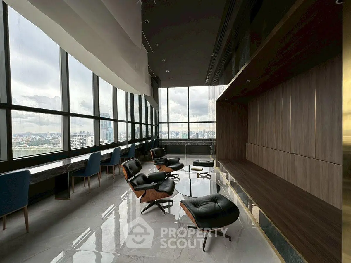 Luxurious high-rise lounge with panoramic city views and modern seating.