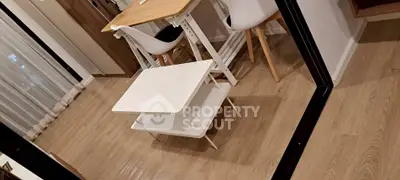 Modern interior with stylish furniture and wooden flooring, perfect for cozy living.