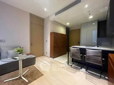 Modern living room with open kitchen and stylish furniture