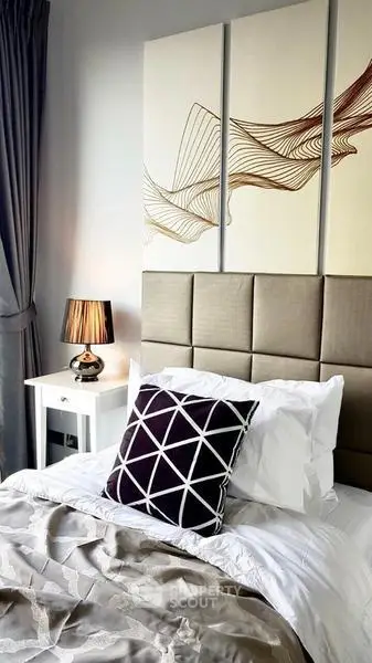 Stylish bedroom with modern decor and elegant lighting