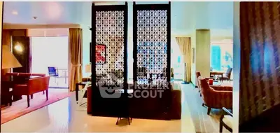 Luxurious living room with elegant decor and spacious seating area, perfect for relaxation and entertainment.