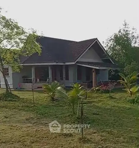 Charming countryside house with lush garden and spacious porch