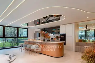 Luxurious modern kitchen with sleek island and large windows overlooking garden