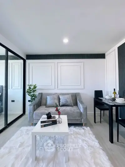 Modern living room with elegant decor and cozy seating area