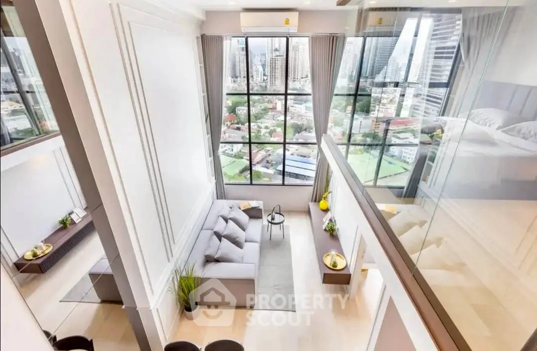 Stunning modern living room with floor-to-ceiling windows and city view