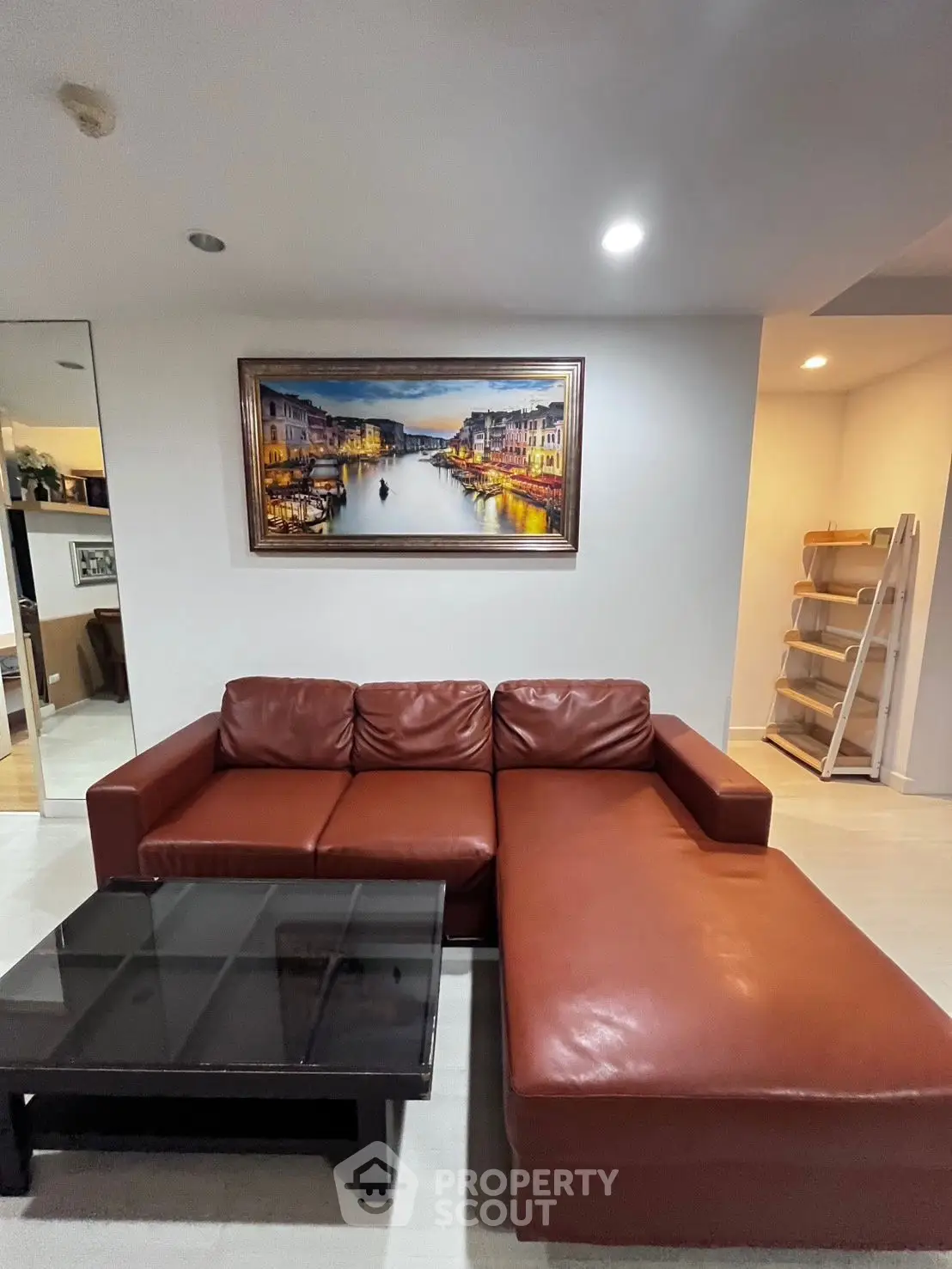 Stylish living room with leather sofa and modern decor