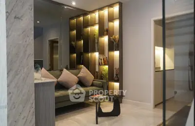 Stylish modern living room with elegant lighting and cozy seating area